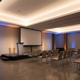 HUSHAN_STAGE_SCENE_20260720|multi-function-wash-light-hlp9024|studio-meeting-light-scene|HLP9024 studio and meeting-room wash-light application scene|broad AI application scene; no product close-up or inferred product exterior